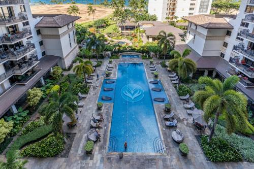 an overhead view of a pool at a resort at Ko Olina Beach Villas O704 in Kapolei