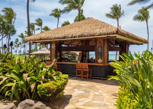 a bar at a resort on the beach at Ko Olina Beach Villas O704 in Kapolei