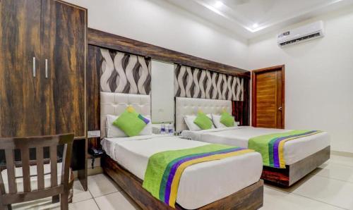 Katil atau katil-katil dalam bilik di Hotel The Savera Park