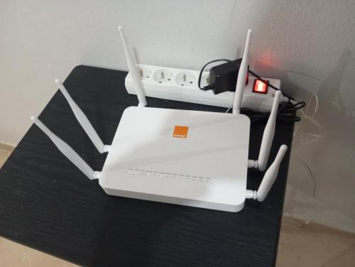 a white machine sitting on top of a table at Appart Bab Alandalous in Tangier