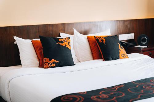 Postel nebo postele na pokoji v ubytování Hotel Shambala
