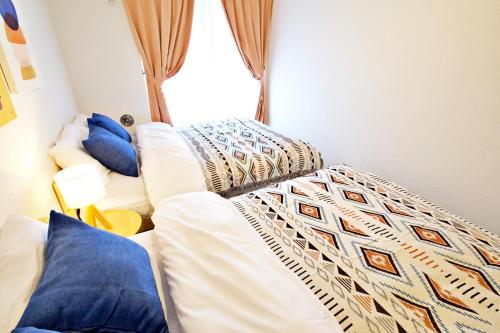 Cama o camas de una habitación en ヒルトップ箱根　103