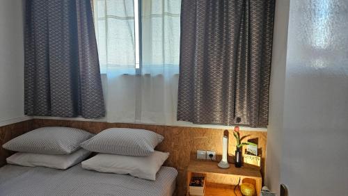 Postel nebo postele na pokoji v ubytování Studio apartman Gradna
