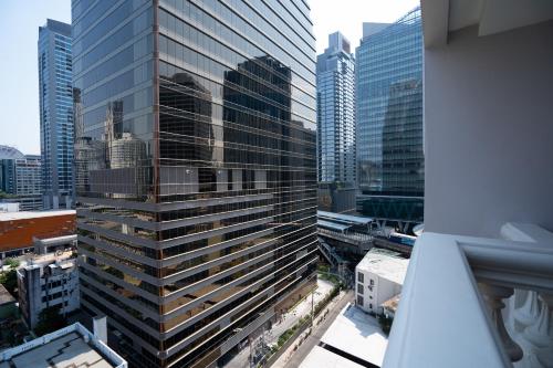 a view of a tall building in a city at NH Bangkok Sukhumvit Boulevard in Bangkok