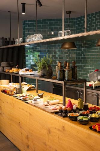 a buffet line with many different types of food at Schönherr Haus in Neustift im Stubaital