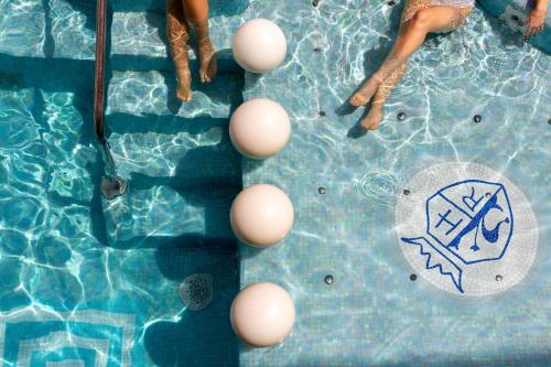 a group of eggs in a swimming pool at Rivoli Boutique Hotel in Florence