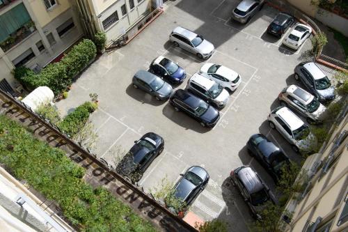 an aerial view of cars parked in a parking lot at Grand Hotel Adriatico in Florence