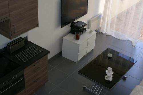 Photo de la galerie de l'établissement Villa 96, Héliovillage au village naturiste, au Cap d'Agde