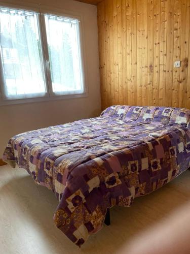 Ένα ή περισσότερα κρεβάτια σε δωμάτιο στο Appartement Daniel