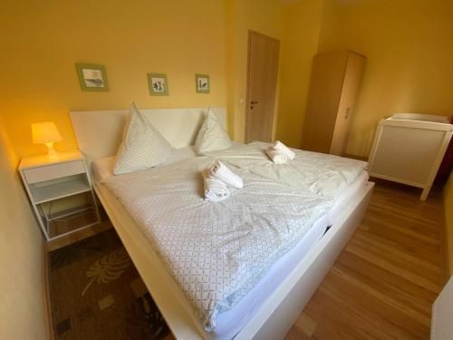 Giường trong phòng chung tại Apartments in der Kopenhagener Straße