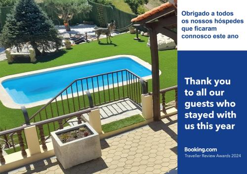 a picture of a swimming pool in a yard at Solar do Madala in Seixo da Beira