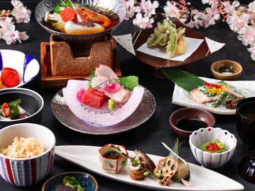 a bunch of plates of food on a table at Nara Royal Hotel in Nara