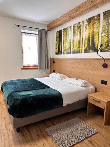 Postel nebo postele na pokoji v ubytování C’era una volta un Re…