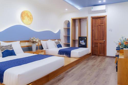Ένα ή περισσότερα κρεβάτια σε δωμάτιο στο Phuc Lam Hotel & Apartment