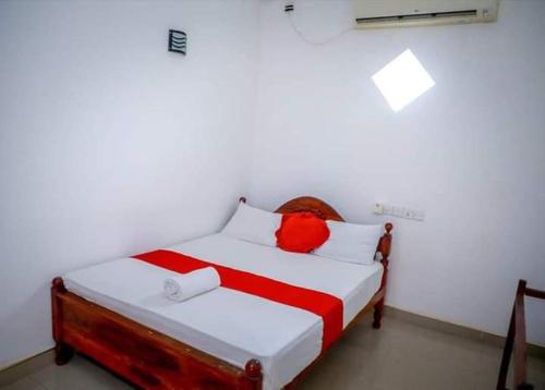 Ein Bett oder Betten in einem Zimmer der Unterkunft happyleoni touristhotel