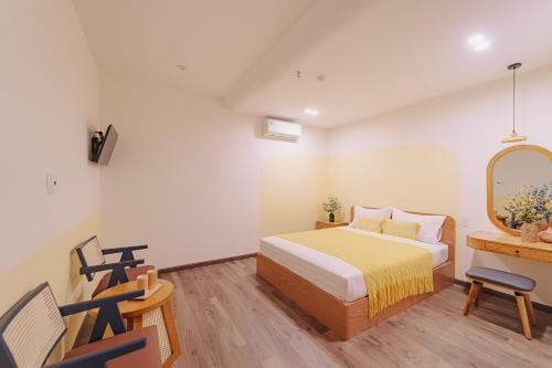 Ένα ή περισσότερα κρεβάτια σε δωμάτιο στο Phuc Lam Hotel & Apartment