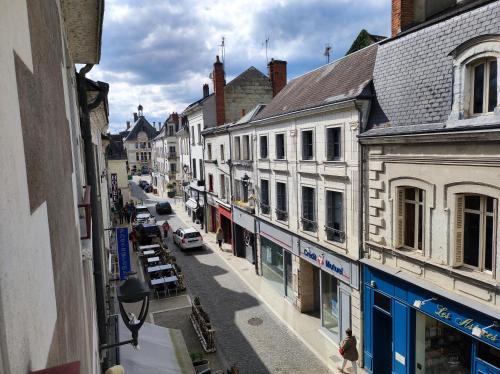 a view of a street in a town with buildings at Ambiance château de la Loire in Montrichard