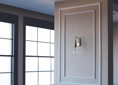 a white door in a room with windows at The Yalı Konak Hotel İzmir in Izmir