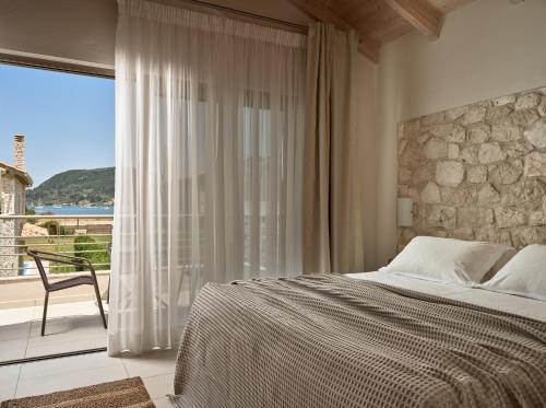Un pat sau paturi într-o cameră la Avesta Private Villas - Iokasti