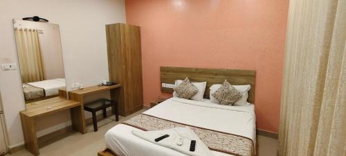 Katil atau katil-katil dalam bilik di GREEN TERRUS BUSINESS CLASS HOTEL