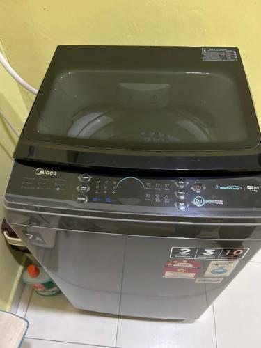 a printer sitting on top of a counter at Havengate Homestay in Butterworth