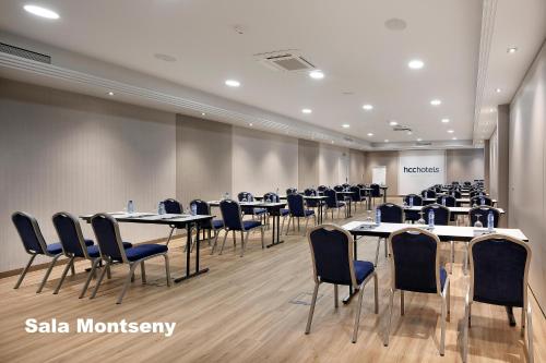 a conference room with tables and chairs in it at HCC St. Moritz in Barcelona
