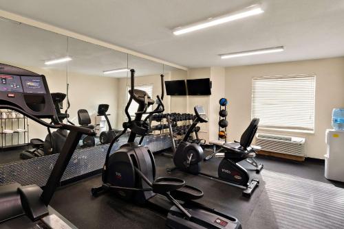 a gym with several exercise bikes in a room at Quality Inn Memphis Northeast near I-40 in Memphis