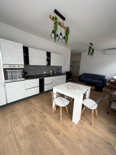 a living room with a white table and chairs at South Valley in Agrigento