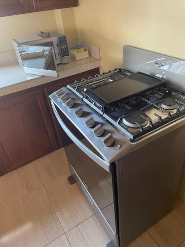 Una cocina o kitchenette en Mari’s RoomPals