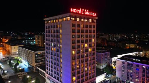 a building with a hotel union sign on top of it at Unirea Hotel & Spa in Iaşi