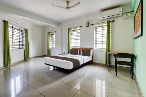 Gallery image of Collection O S M SUITES in Bangalore