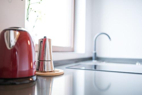 Příslušenství pro přípravu čaje a kávy v ubytování Agriturismo Grion
