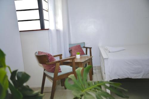 Ένα ή περισσότερα κρεβάτια σε δωμάτιο στο Maureen Nairobi CBD Modern Studio Apartments at Eagle tower