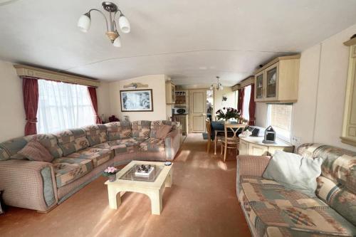 Posezení v ubytování Chalet De Nollen P12 - Camping De Nollen Callantsoog
