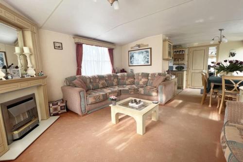Posezení v ubytování Chalet De Nollen P12 - Camping De Nollen Callantsoog