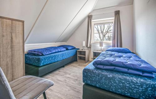 Voodi või voodid majutusasutuse Gorgeous Home In Den Ham With Sauna toas