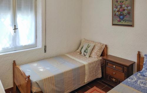 Katil atau katil-katil dalam bilik di Cozy Home In Orgosolo