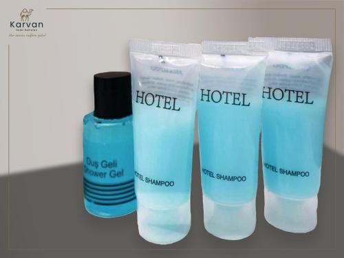 a group of three bottles of moisturizing moisturizing moisturizers at Karvan Hotel Naftalan in Naftalan