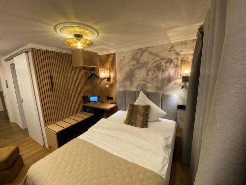 Postel nebo postele na pokoji v ubytování Boutique - Hotel Zum Schloss