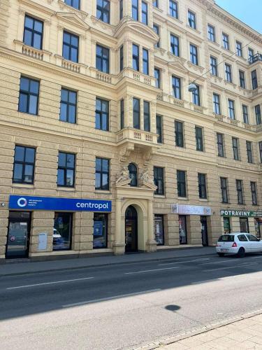 a large building on the side of a street at Comfort Place Brno, Bratislavská in Brno