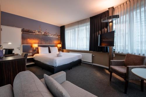 Postel nebo postele na pokoji v ubytování Hotel Docklands