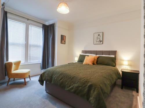 Una cama o camas en una habitación de Mabel