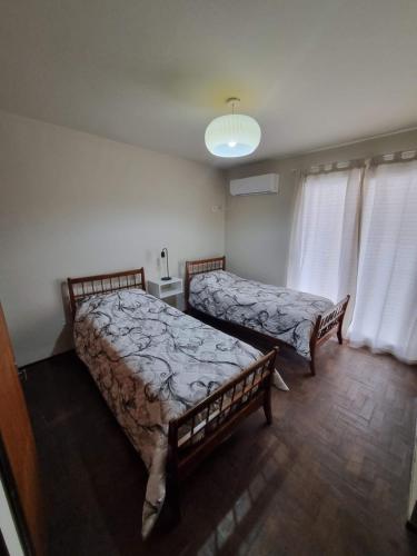 Postel nebo postele na pokoji v ubytování HERMOSO - CATEGORIA Departamento 90 m2 CENTRO con COCHERA opcional