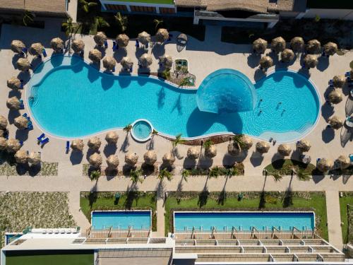 an aerial view of a pool at a resort at Serenade All Suites - Adults Only Resort in Punta Cana