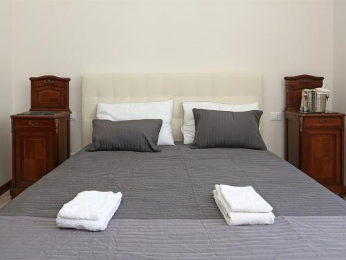 En eller flere senge i et værelse på Camere del Camerlengo