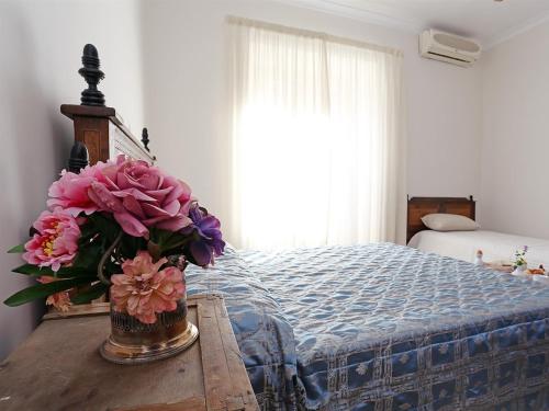 En eller flere senge i et værelse på Camere del Camerlengo