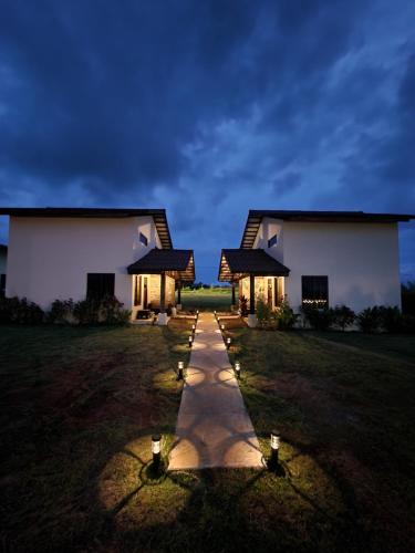 a pathway leading to a house at night at Catalina Cabins in Santa Catalina