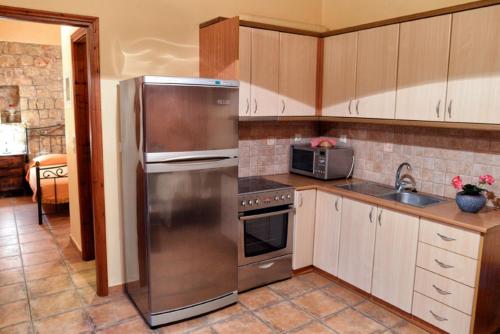 Dapur atau dapur kecil di Olympia Villas