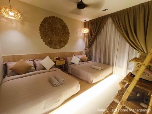 Кровать или кровати в номере Bali Residence Melaka by Jeffery Lam Home Management
