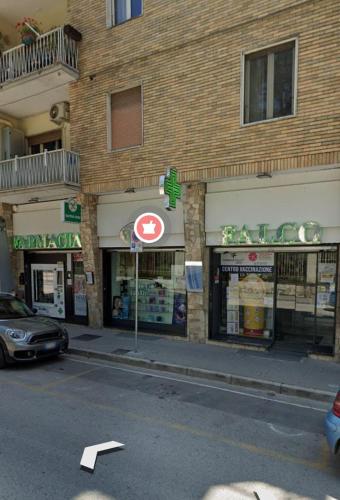 a store on the side of a city street at Afrodite Guest House in Caserta